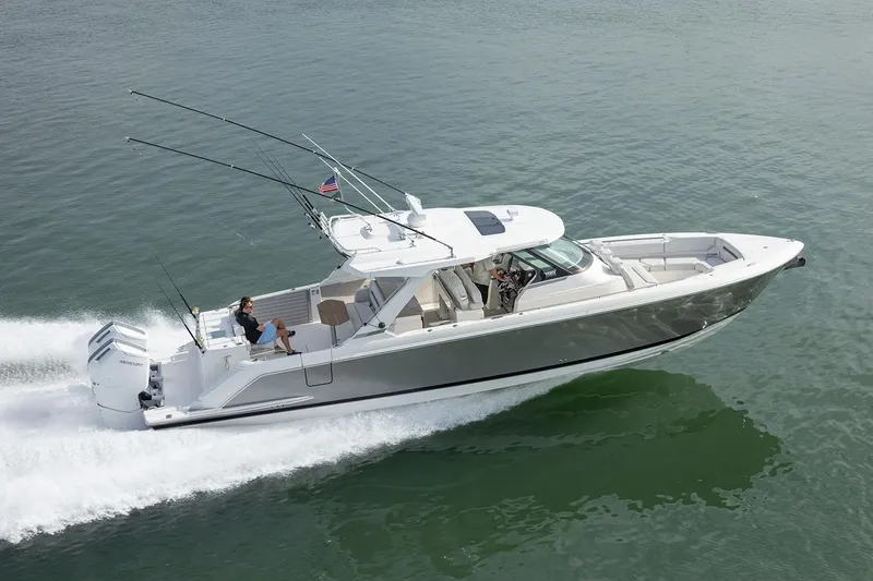 The Image of Manufacturer Provided Image: 2025 Tiara Yachts 43 LS cruising on open water, showcasing sleek design and performance. - 0