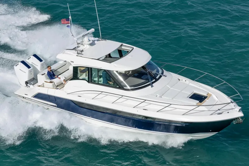 The Image of Manufacturer Provided Image: 2026 Tiara Yachts 39 LE cruising on open water, showcasing sleek design and powerful engines. - 0