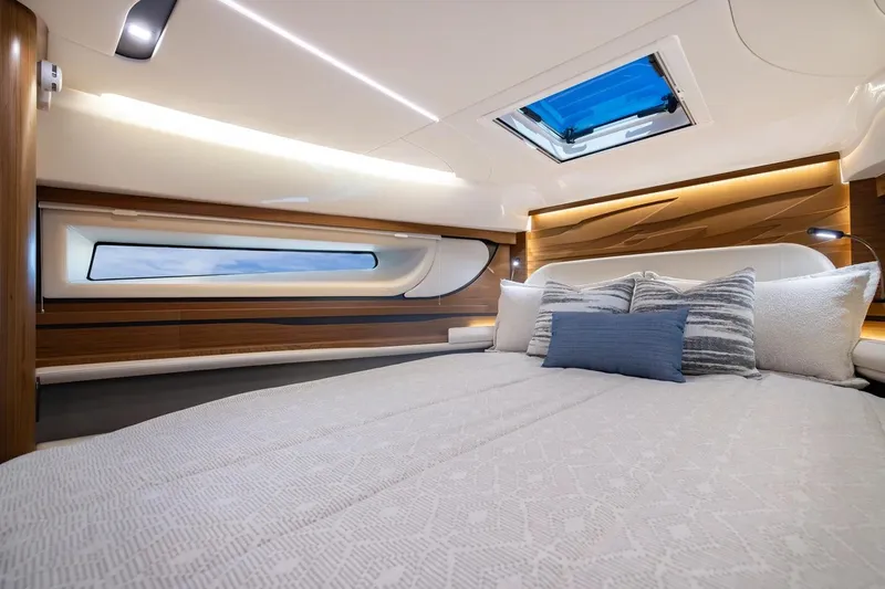 Slide: The Image of Manufacturer Provided Image: Luxurious interior cabin of 2026 Tiara Yachts 39 LE with modern design and skylight. - 16