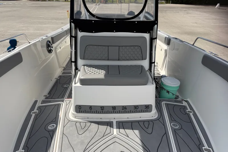 Slide: The Image of 2006 Century 3200 Center Console boat interior with seating and measuring guide. - 4