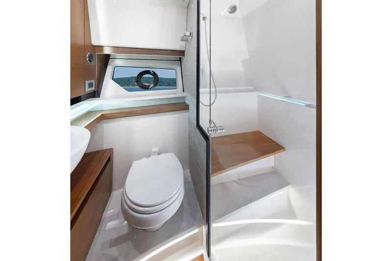 Slide: The Image of Manufacturer Provided Image: Luxurious bathroom in 2025 Tiara Yachts 43 LE, featuring modern fixtures and ocean view. - 16