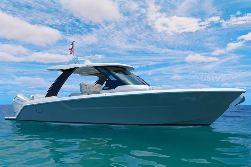 The Image of Manufacturer Provided Image: 2026 Tiara Yachts 35 LS cruising on clear blue water under a bright sky. - 0