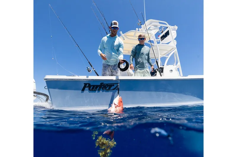 Slide: The Image of Manufacturer Provided Image: Two people fishing on a 2027 Parker 240 Coastal Elite boat. - 3
