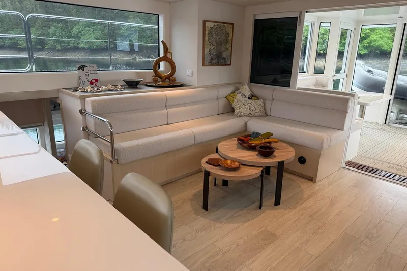 Slide: The Image of Luxurious interior of 2023 Longreach 58 Expedition yacht with modern seating and decor. - 27