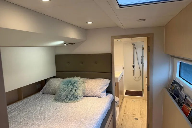 Slide: The Image of Luxurious bedroom and ensuite bathroom in 2023 Longreach 58 Expedition yacht. - 64