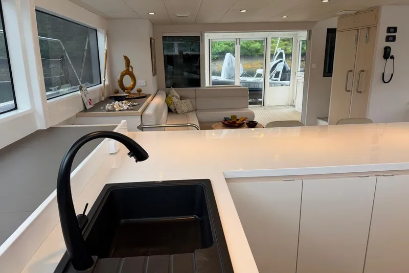Slide: The Image of Luxurious interior of 2023 Longreach 58 Expedition yacht with modern kitchen and seating area. - 44