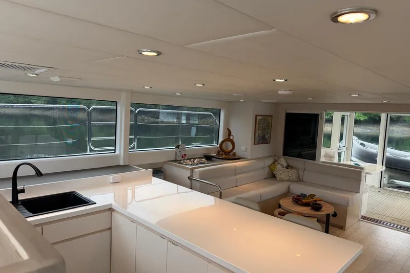 Slide: The Image of Luxurious interior of 2023 Longreach 58 Expedition yacht with modern kitchen and seating area. - 45