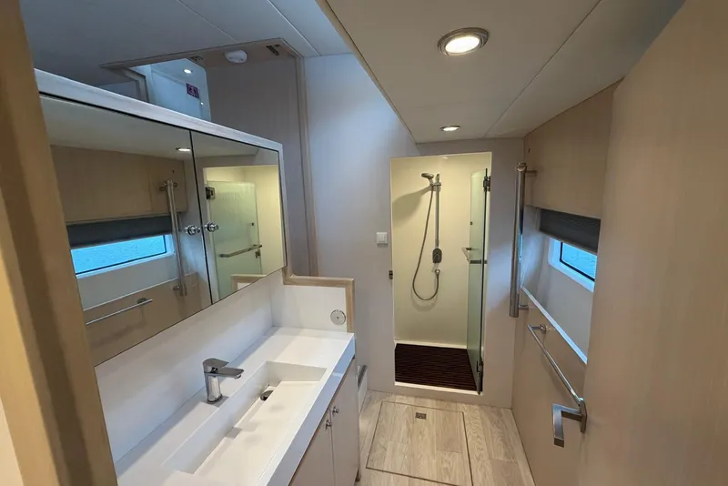 Slide: The Image of Modern bathroom interior of 2023 Longreach 58 Expedition yacht, featuring sleek design and spacious shower. - 56