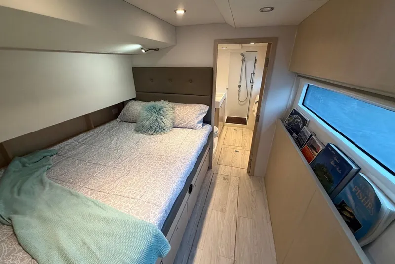 Slide: The Image of Luxurious bedroom interior of 2023 Longreach 58 Expedition yacht with ensuite bathroom. - 71