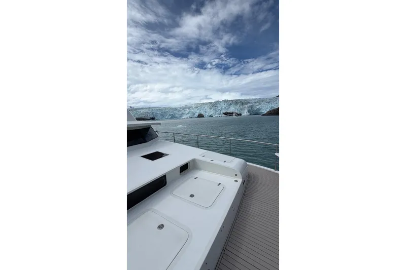 Slide: The Image of Luxury Longreach 58 yacht deck with stunning glacier view, 2023 model. - 8