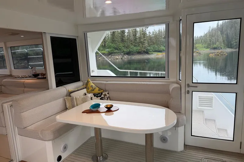 Slide: The Image of Luxurious interior of 2023 Longreach 58 Expedition yacht with scenic water view. - 20