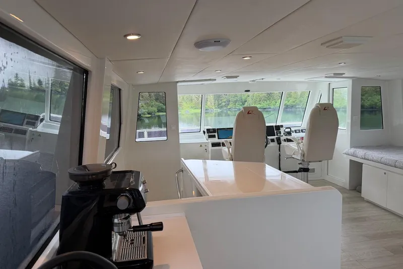 Slide: The Image of Interior of 2023 Longreach 58 Expedition yacht with modern helm and coffee machine. - 22