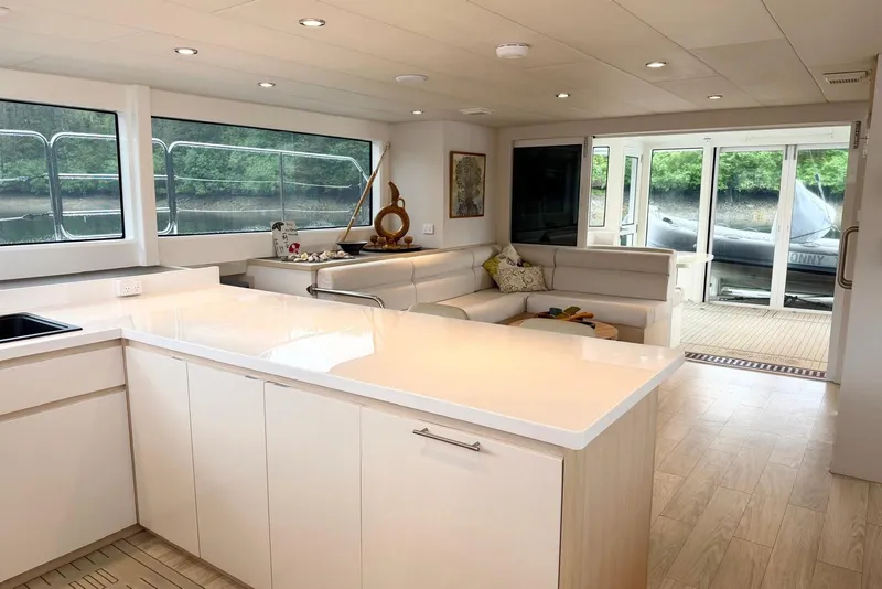 Slide: The Image of Luxurious interior of 2023 Longreach 58 Expedition yacht with modern kitchen and seating area. - 33