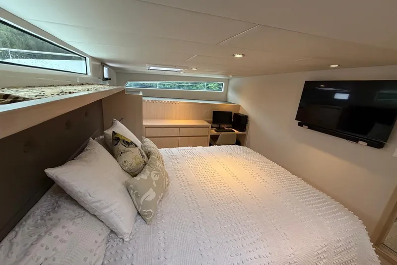 Slide: The Image of Luxurious bedroom interior of 2023 Longreach 58 Expedition yacht with modern amenities. - 61