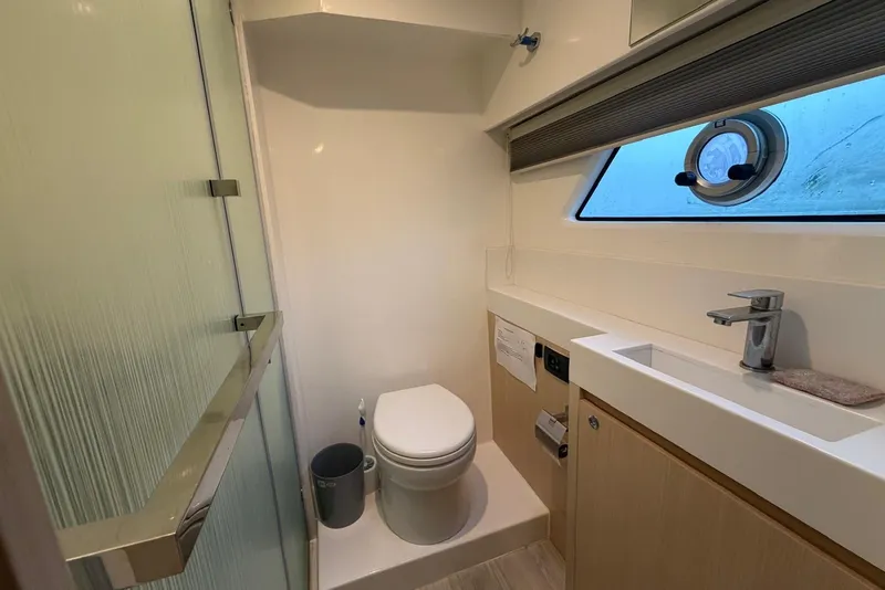 Slide: The Image of Modern bathroom in 2023 Longreach 58 Expedition yacht with shower, toilet, and sink. - 74
