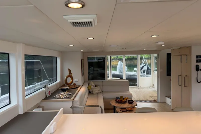Slide: The Image of Luxurious interior of 2023 Longreach 58 Expedition yacht with modern furnishings and large windows. - 35