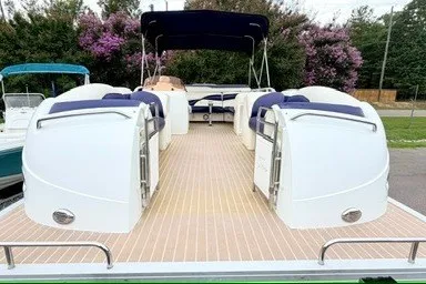 Slide: The Image of 2006 JC Neptoon TT Triple Tube pontoon boat with spacious deck and seating. - 3