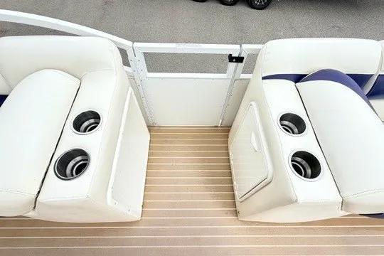 Slide: The Image of Interior seating of 2006 JC 23 Neptoon TT boat with cup holders. - 11