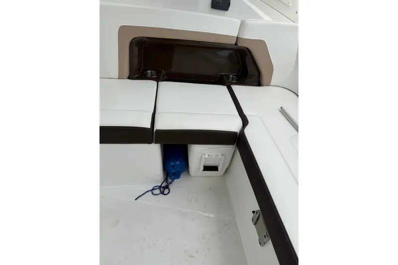 Slide: The Image of Interior seating of 2016 Monterey 328SS Super Sport boat with storage compartment. - 24