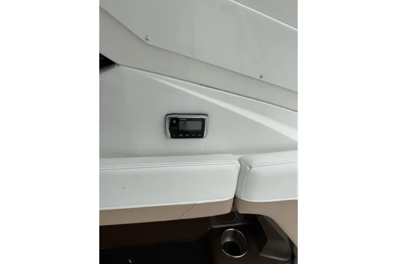 Slide: The Image of Interior of 2016 Monterey 328SS Super Sport boat with control panel and seating. - 25