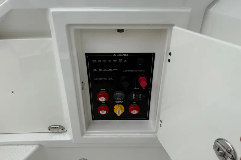 Slide: The Image of Control panel inside 2016 Monterey 328SS Super Sport boat compartment. - 13