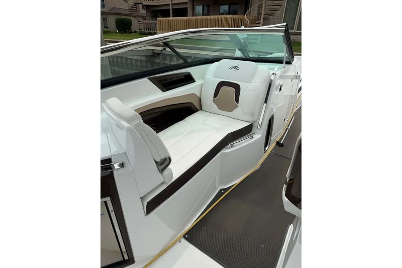 Slide: The Image of 2016 Monterey 328SS Super Sport boat interior with white seating and sleek design. - 16