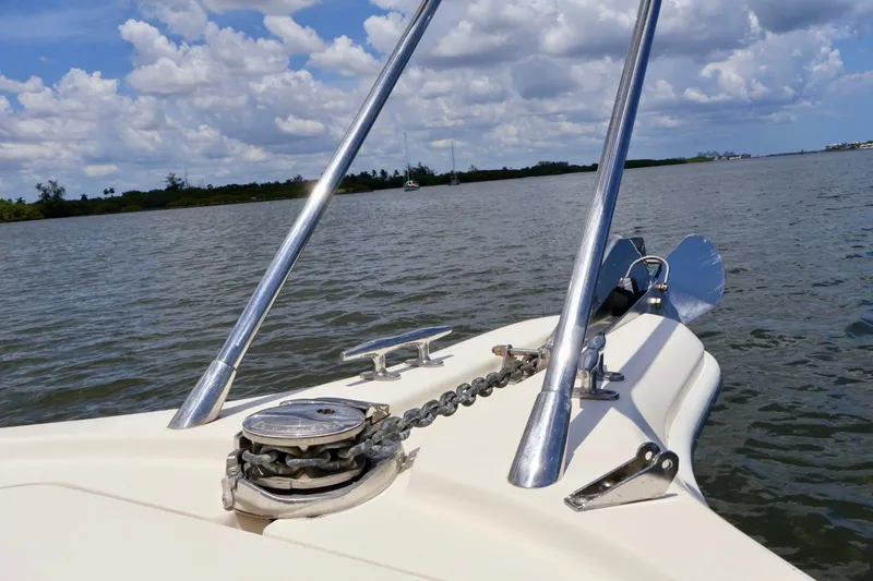 Slide: The Image of Bow of 2003 Scout 280 Abaco boat with anchor chain on calm water. - 22