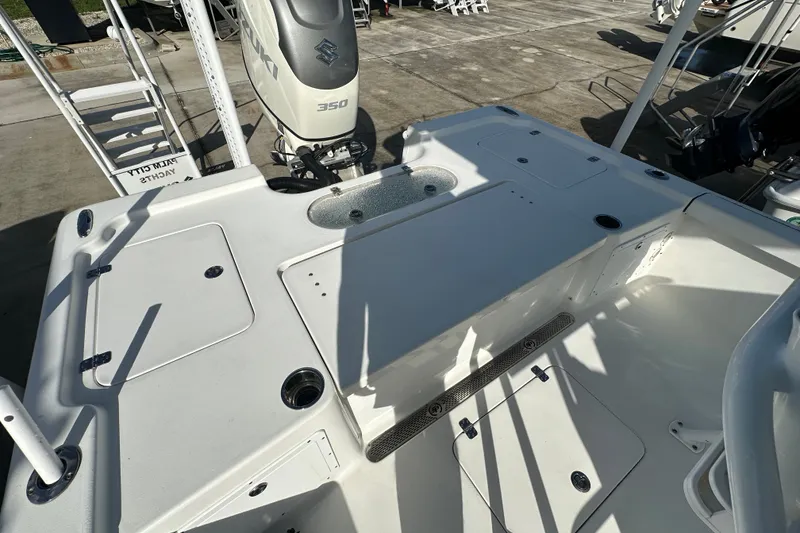 Slide: The Image of 2018 Sea Pro 248 Bay boat deck with Suzuki 350 outboard motor. - 17