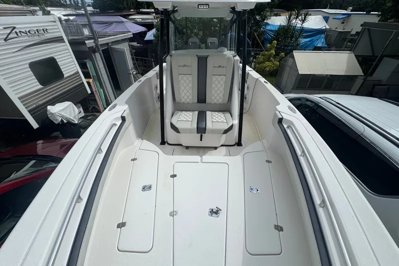 Slide: The Image of 2011 Donzi 29 ZF Open boat interior with seating and storage compartments. - 46
