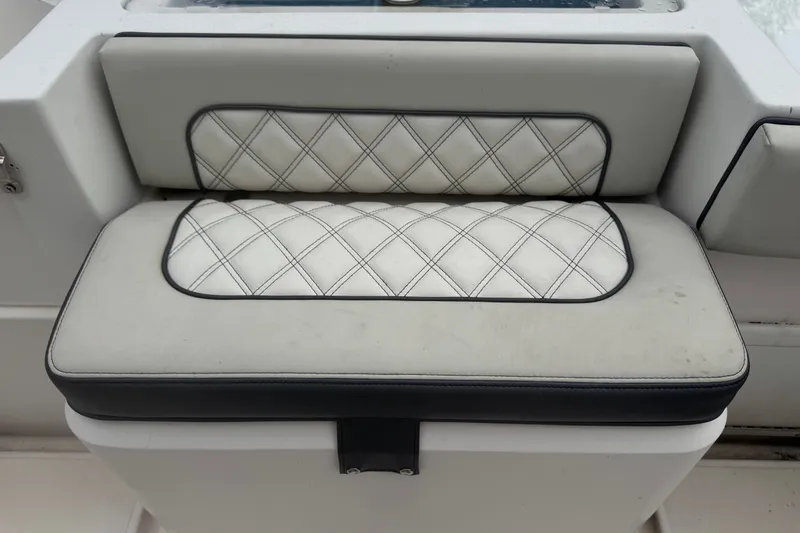Slide: The Image of Cushioned seat on 2011 Donzi 29 ZF Open boat with diamond-pattern stitching. - 20