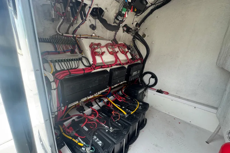 Slide: The Image of Electrical system of a 2011 Donzi 29 ZF Open boat, featuring batteries and wiring. - 45