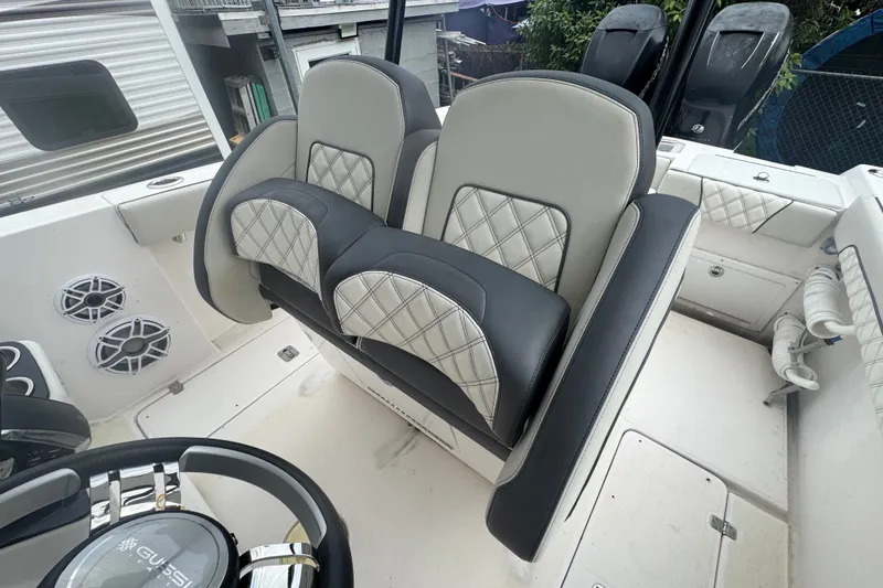 Slide: The Image of 2011 Donzi 29 ZF Open boat interior with stylish seating and modern design. - 26
