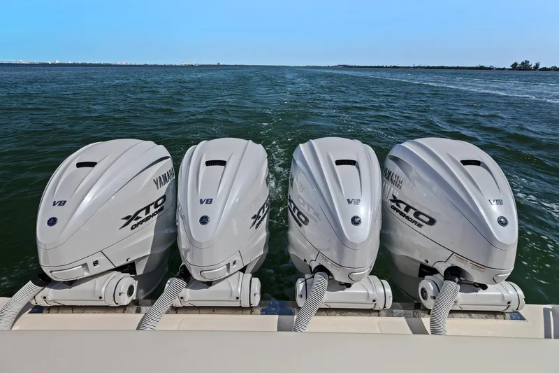 Slide: The Image of Four Yamaha XTO Offshore V8 engines on a 2023 Grady-White Canyon 456 boat. - 28