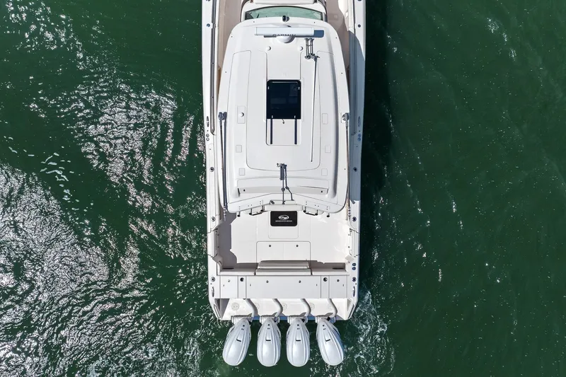 Slide: The Image of Aerial view of 2023 Grady-White Canyon 456 boat on water. - 25