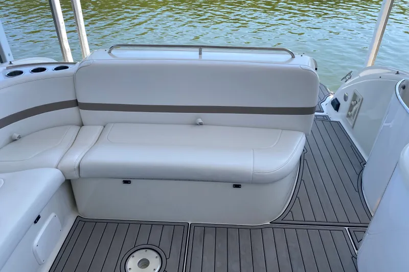 Slide: The Image of Luxury seating on a 2000 Formula 400 Super Sport boat, overlooking calm waters. - 10