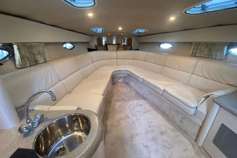 Slide: The Image of Luxurious interior of a 2000 Formula 400 Super Sport yacht with plush seating and modern amenities. - 31