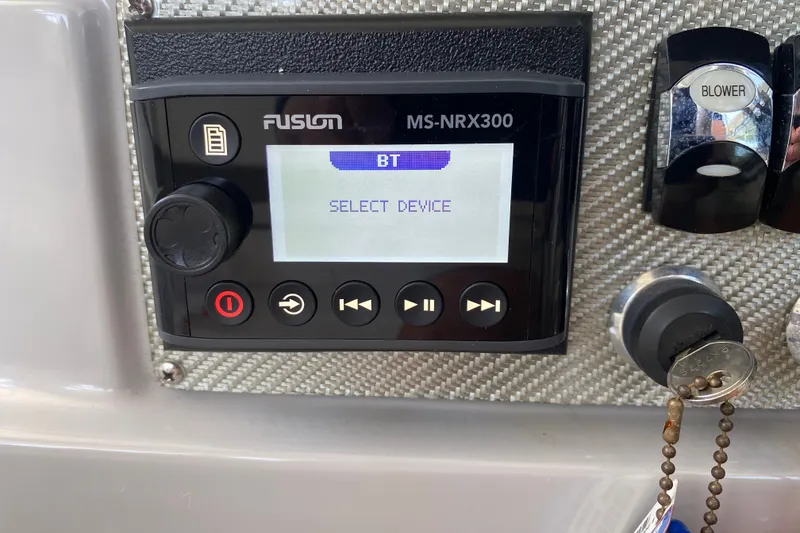 Slide: The Image of Fusion MS-NRX300 stereo system on a 2000 Formula 400 Super Sport boat dashboard. - 24