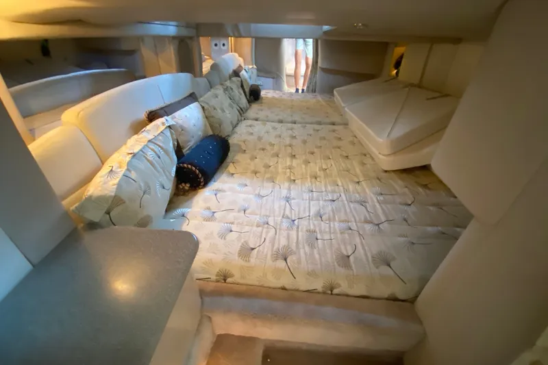 Slide: The Image of Interior of 2000 Formula 400 Super Sport yacht with cozy bedding and cushions. - 37