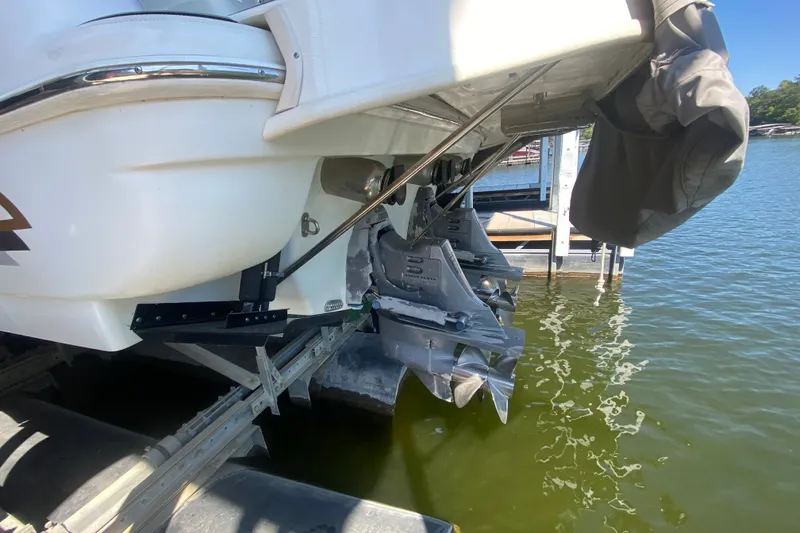 Slide: The Image of Rear view of a 2000 Formula 400 Super Sport boat with dual propellers. - 56