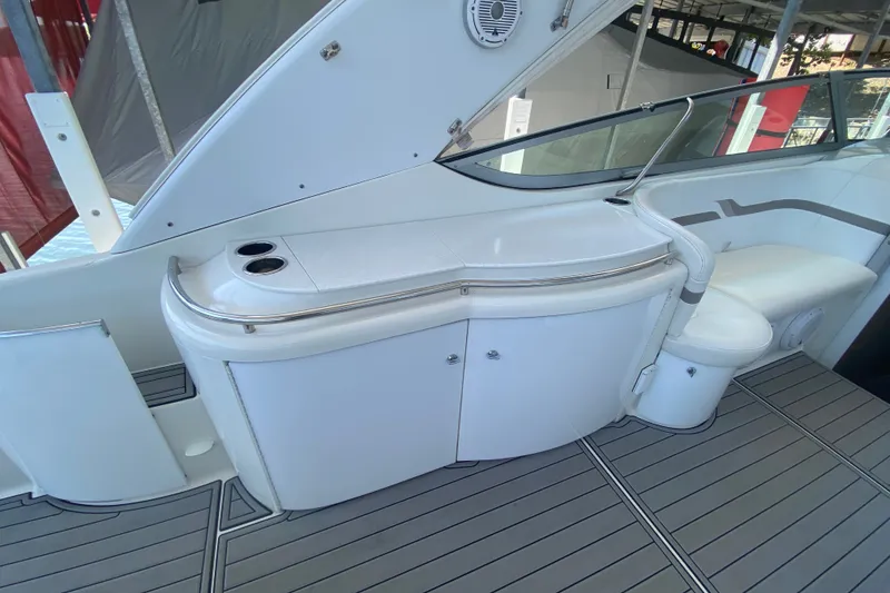 Slide: The Image of Interior of a 2000 Formula 400 Super Sport boat, featuring sleek white cabinetry. - 11
