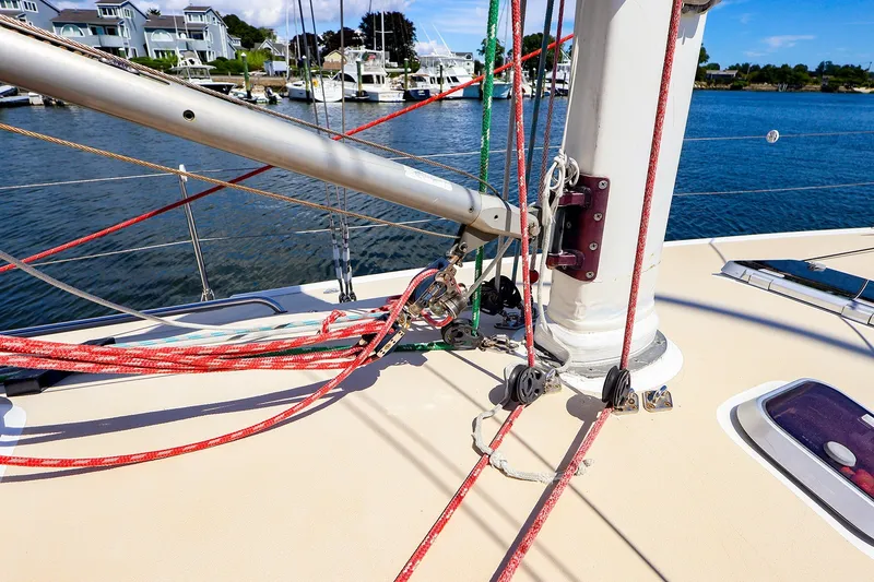 Slide: The Image of Deck view of a 2002 J Boats J/120 sailboat with rigging and mast details. - 27