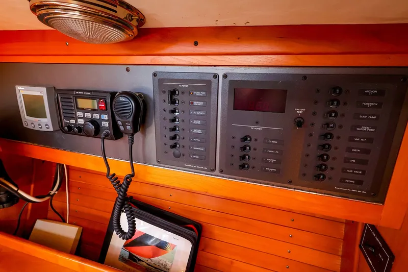 Slide: The Image of Control panel of a 2002 J Boats J/120 sailboat with communication equipment. - 40