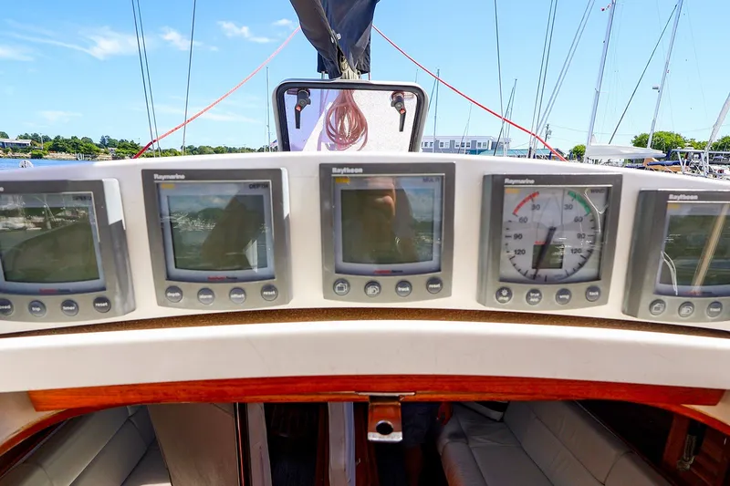 Slide: The Image of Cockpit of 2002 J Boats J/120 with Raymarine navigation instruments. - 33