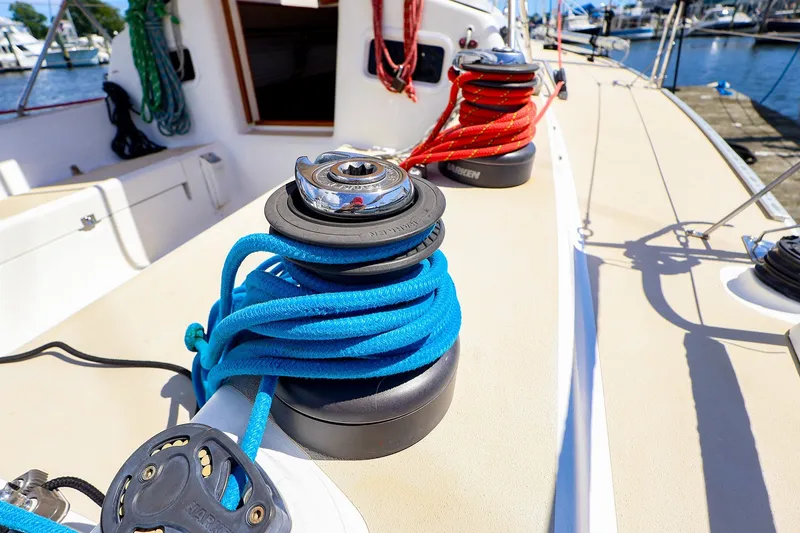 Slide: The Image of Close-up of winches and ropes on a 2002 J Boats J/120 sailboat deck. - 15