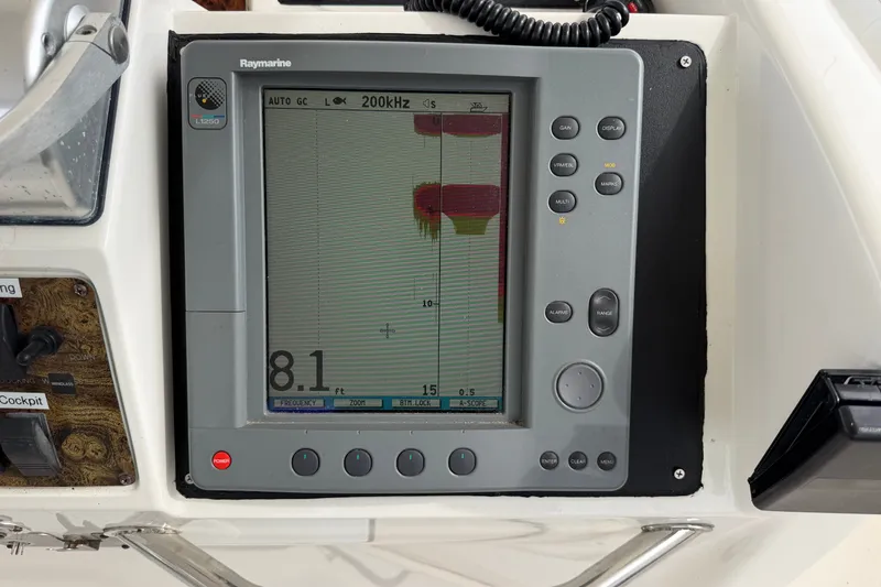 Slide: The Image of Raymarine display on 1997 Sea Ray 550 Sedan Bridge showing depth of 8.1 feet. - 16
