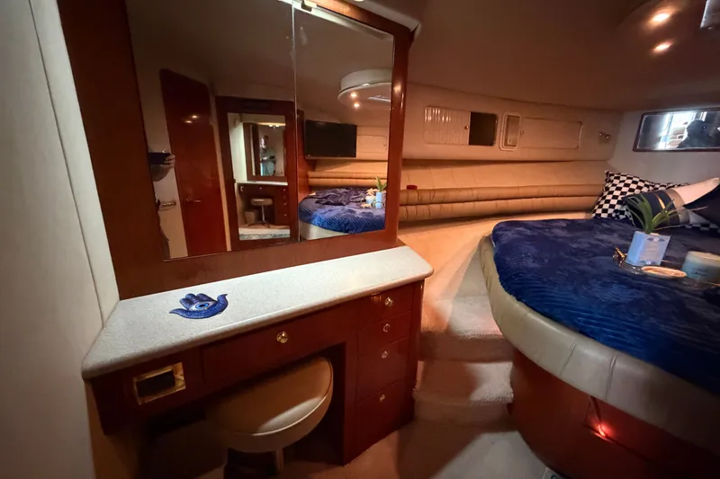 Slide: The Image of Luxurious interior of a 1997 Sea Ray 550 Sedan Bridge yacht with elegant furnishings. - 37