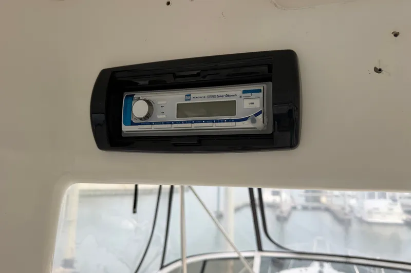 Slide: The Image of Stereo system on a 1997 Sea Ray 550 Sedan Bridge yacht interior. - 20