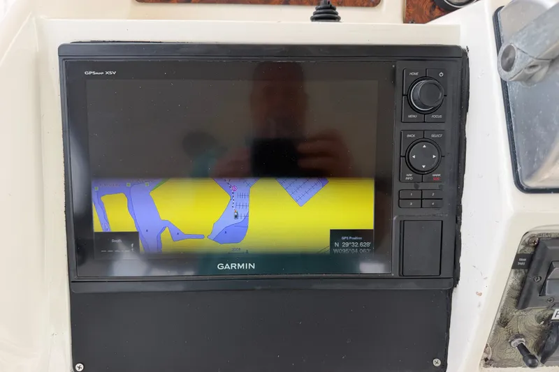 Slide: The Image of Garmin GPS display on 1997 Sea Ray 550 Sedan Bridge showing navigation map. - 18