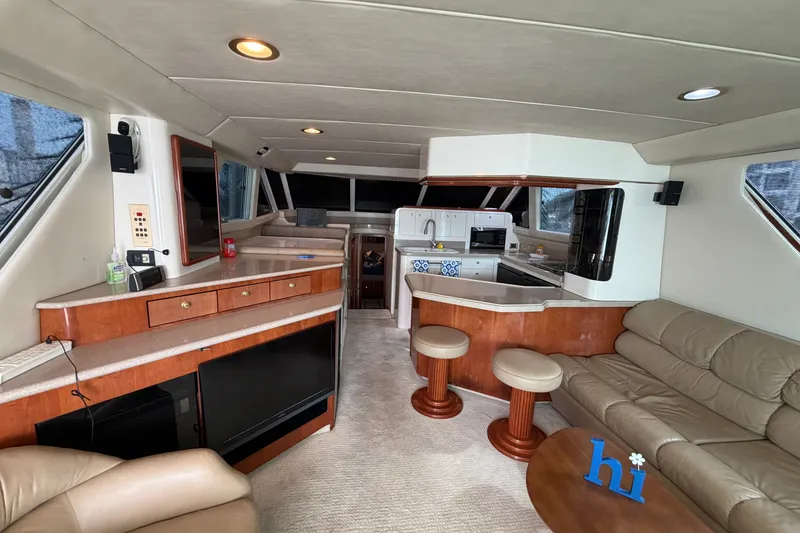 Slide: The Image of Luxurious interior of a 1997 Sea Ray 550 Sedan Bridge yacht with modern amenities. - 24