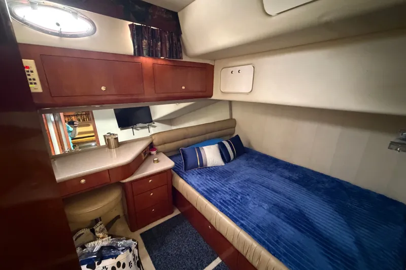 Slide: The Image of Luxurious cabin interior of 1997 Sea Ray 550 Sedan Bridge yacht. - 33